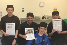 Students at Ganton School with symbol-supported Tom Kerridge recipes.